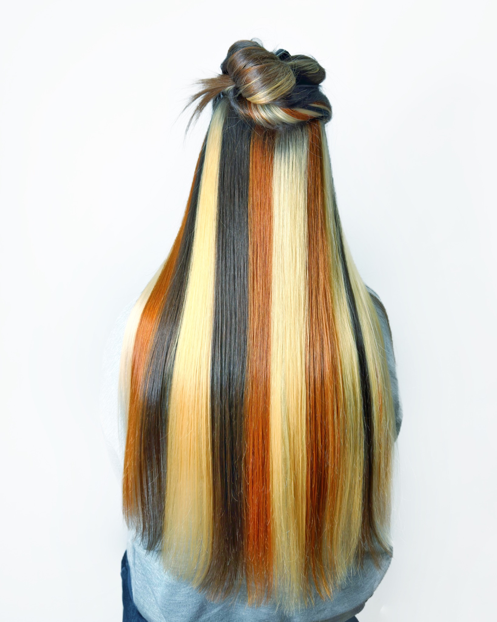 Colorblock cobre, negro y rubio realizado en Medussa Hair